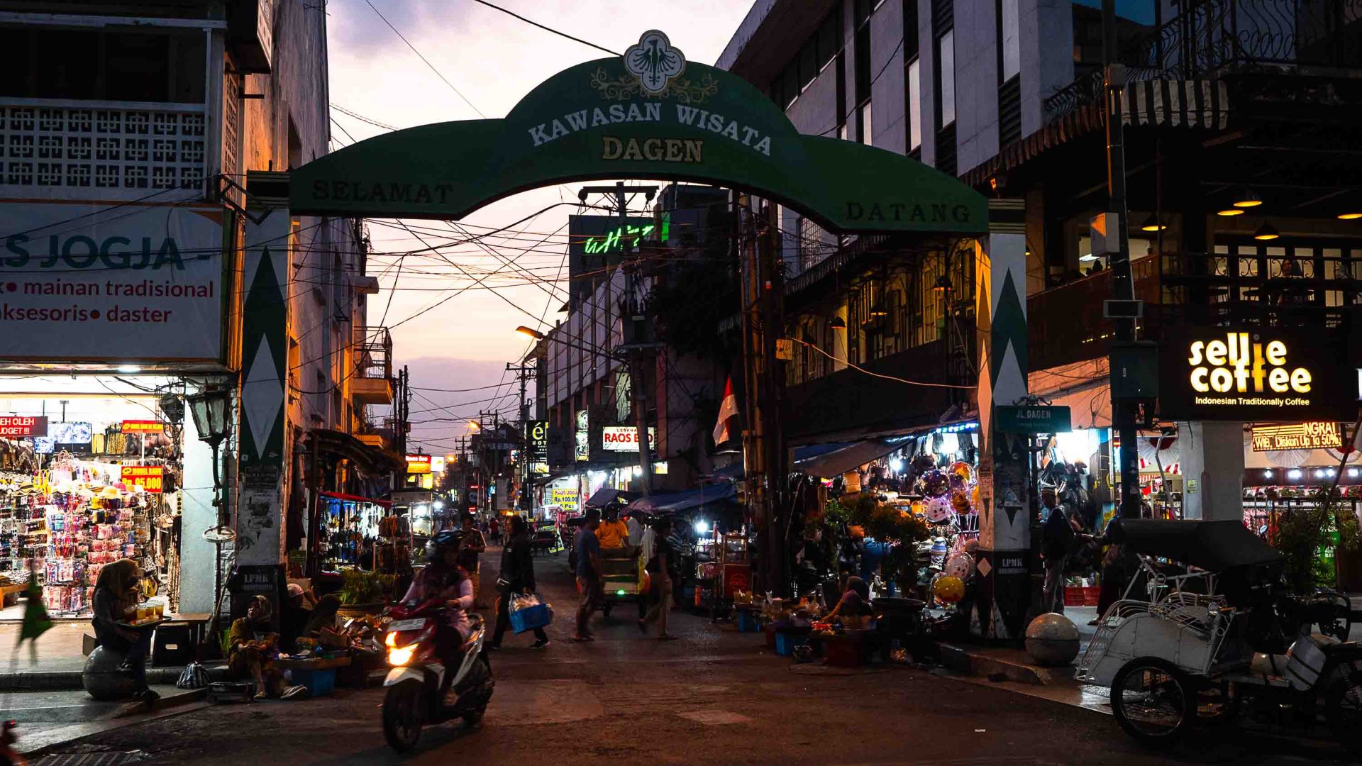 A busy street at night.